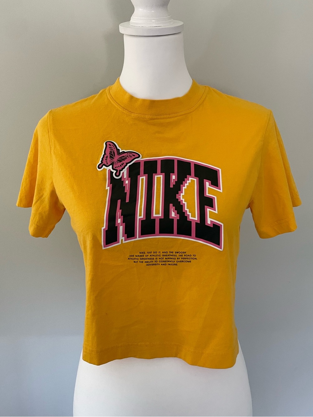 Nike Gold Crop Tee with Pink-Outlined Black Logo